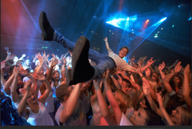 Audience under stage lighting