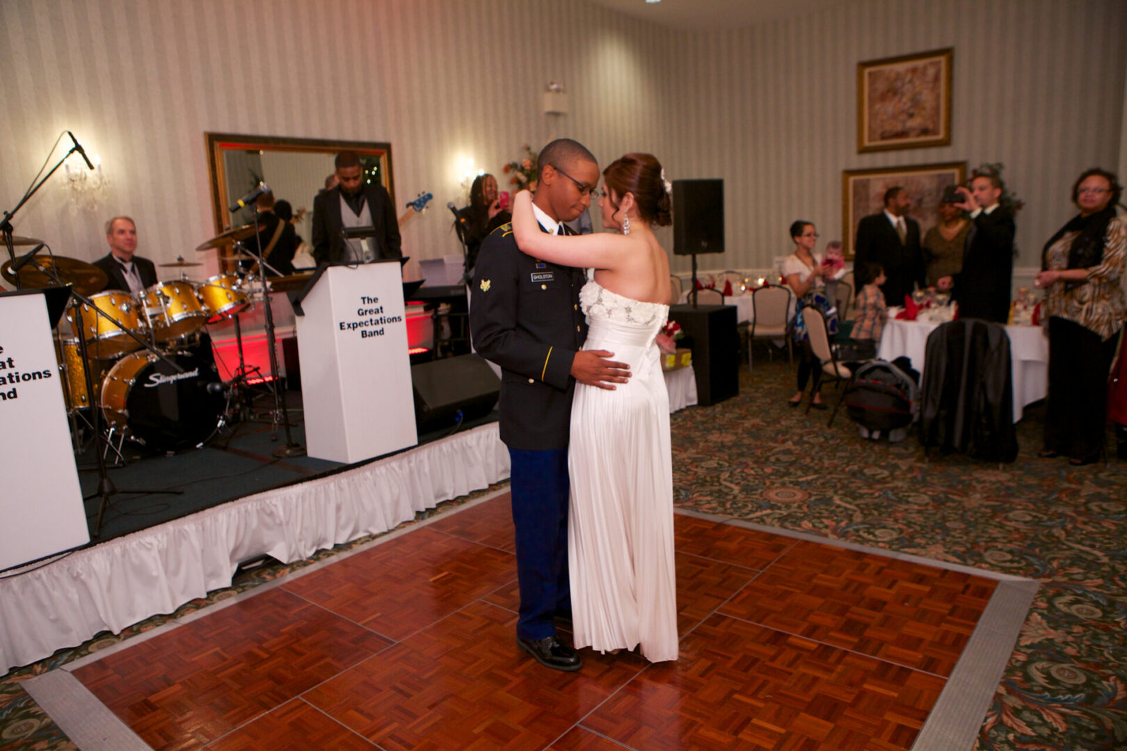 A couple is dancing at their wedding.