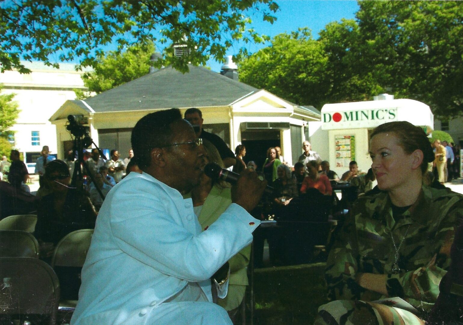 A man and woman are playing music together.